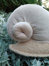 Load image into Gallery viewer, The curly shell of a neutral plushy snail
